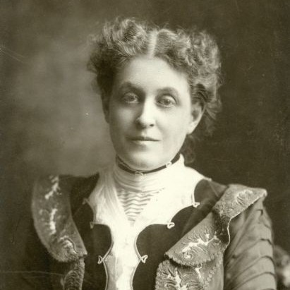 A black and white portrait photographic of Carrie Chapman